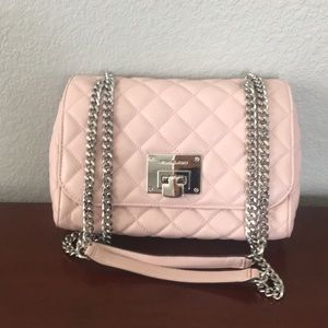 Michael Kors quilted lambskin crossbody bag.